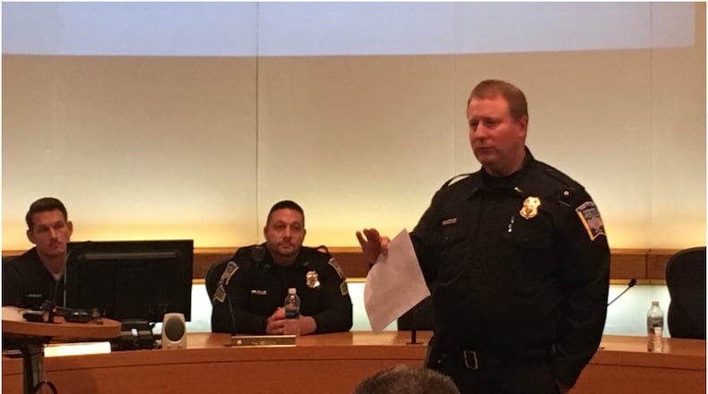 Lt. David Birk of the Middletown Division of Police addressed members of the church community Friday afternoon to discuss ways to better secure their buildings. Detective Brandon Highley and Sgt. Sam Allen also spoke. RICK McCRABB/STAFF