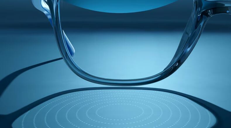 In this photo provided by EssilorLuxottica in October 2025, refractions caused by lenslets embedded in the company's Stellest eyeglass lens are projected onto a table. (Luxottica via AP)