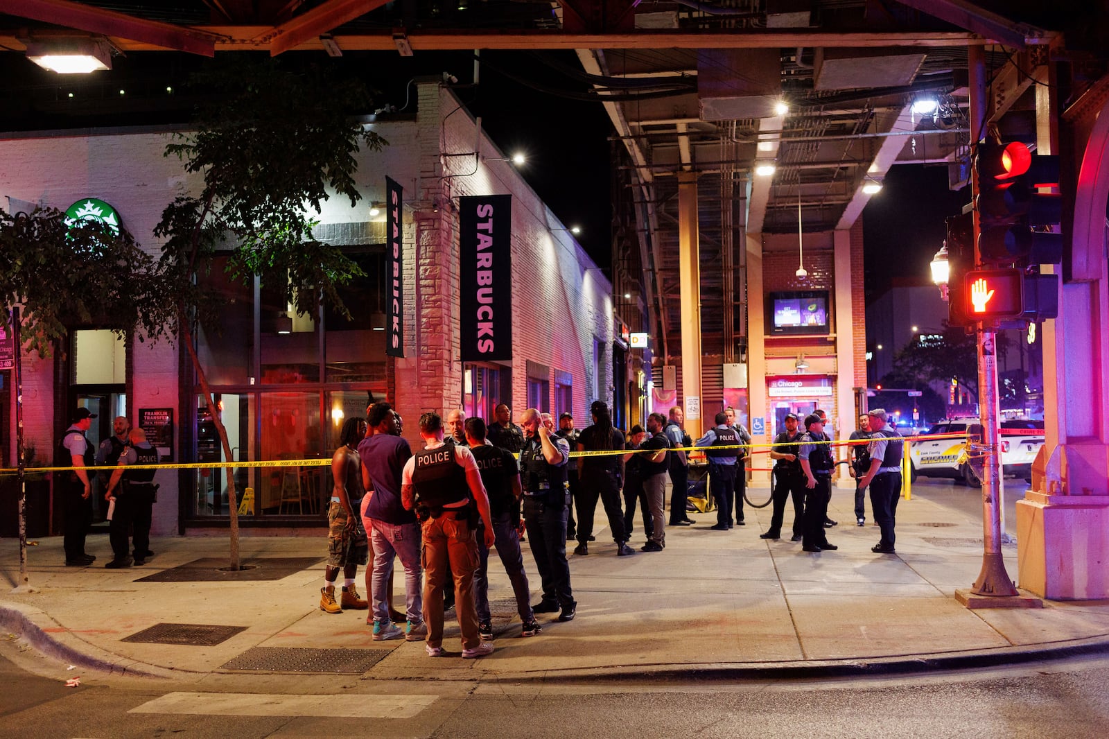 Officers work the scene of a shooting Wednesday, July 2, 2025, in Chicago. (Armando L. Sanchez/Chicago Tribune via AP)