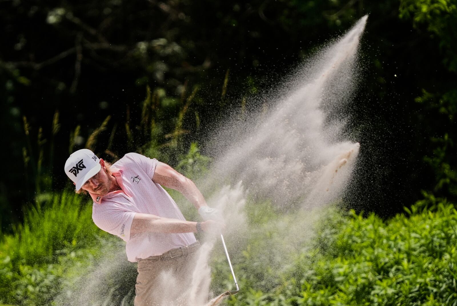 Jake Knapp hits out of the sand on the 5th fairway during the final round of the PGA Zurich Classic golf tournament at TPC Louisiana in Avondale, La., Sunday, April 27, 2025. (AP Photo/Gerald Herbert)
