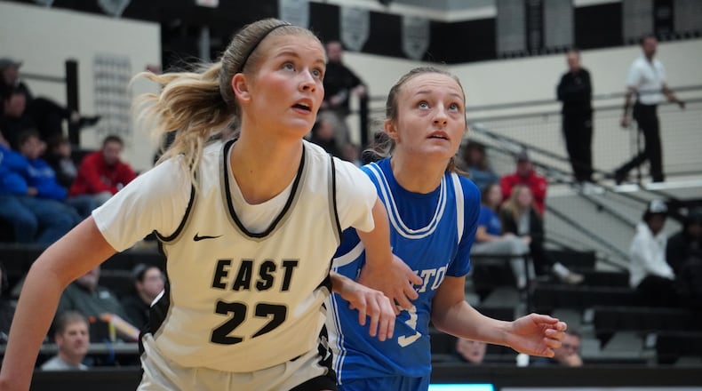 Lakota East’s Bella Sturgill boxes out Hamilton’s Brookelyn Murrell during their game on Friday at Lakota East. CHRIS VOGT / CONTRIBUTED