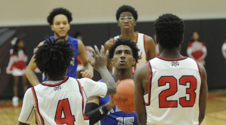 Xenia’s Samari Curtis (with ball) scored 20 points. Trotwood-Madison defeated visiting Xenia 95-60 in a boys high school basketball game on Friday, Dec. 14, 2018. MARC PENDLETON / STAFF