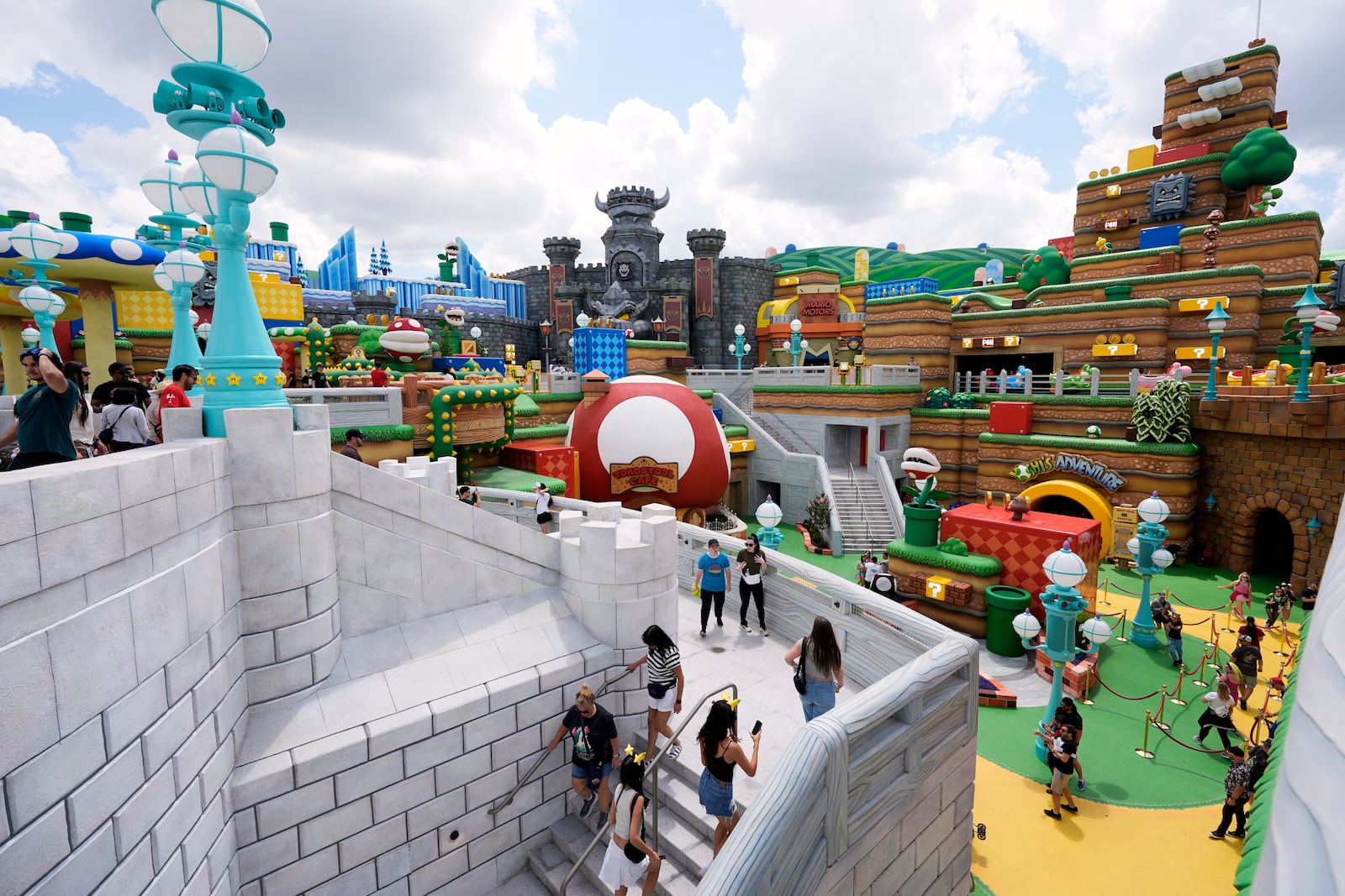 Guests check out the various parts of Super Nintendo World at Epic Universe at Universal Resort Orlando Thursday, April 10, 2025, in Orlando, Fla. (AP Photo/John Raoux)