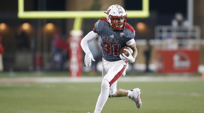 OXFORD, OHIO - NOVEMBER 13: Maurice Thomas #31 of the Miami of Ohio Redhawks runs the ball in the game against the Bowling Green Falcons during the third quarter at Yager Stadium on November 13, 2019 in Oxford, Ohio. (Photo by Justin Casterline/Getty Images)