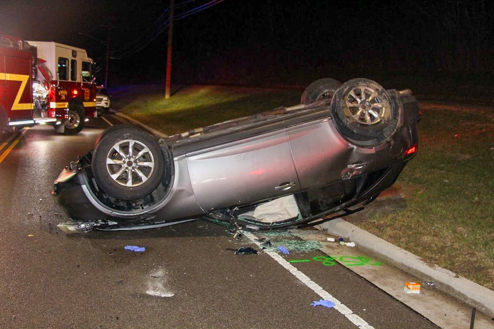 A 2007 Infinity FX35 rests on its top following a crash with an ambulance Tuesday, Jan. 6, 2026. A West Chester Police Department investigation determined a 43-year-old Liberty Twp. woman caused a fatal crash by veering left of center and into an oncoming ambulance, killing her and seriously injuring a 14‑year‑old passenger. PHOTO COURTESY WEST CHESTER POLICE DEPARTMENT