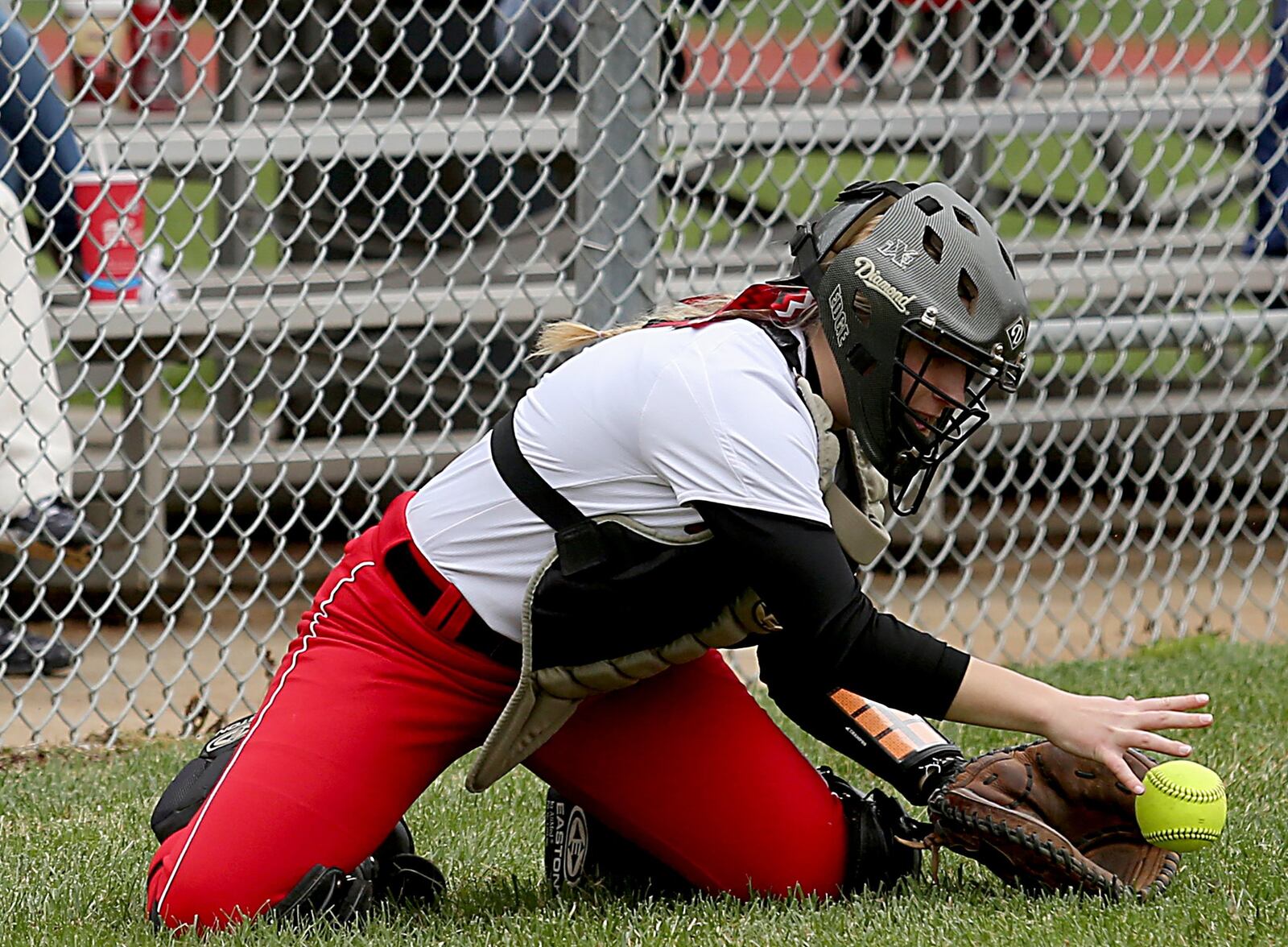 Madison catcher Jackie Kovscek just misses catching a Ross foul ball during Saturday’s game at Ross. CONTRIBUTED PHOTO BY E.L. HUBBARD