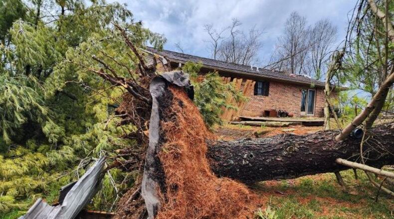 A property on West Alexandria Road in Madison Twp. was damaged Monday afternoon during a storm with high winds. Much of the southwest Ohio area was under a tornado warning at that time. A funnel cloud was spotted in the Carlisle, Germantown and Middletown areas and hail as large as a half-dollar was reported. NICK GRAHAM/STAFF