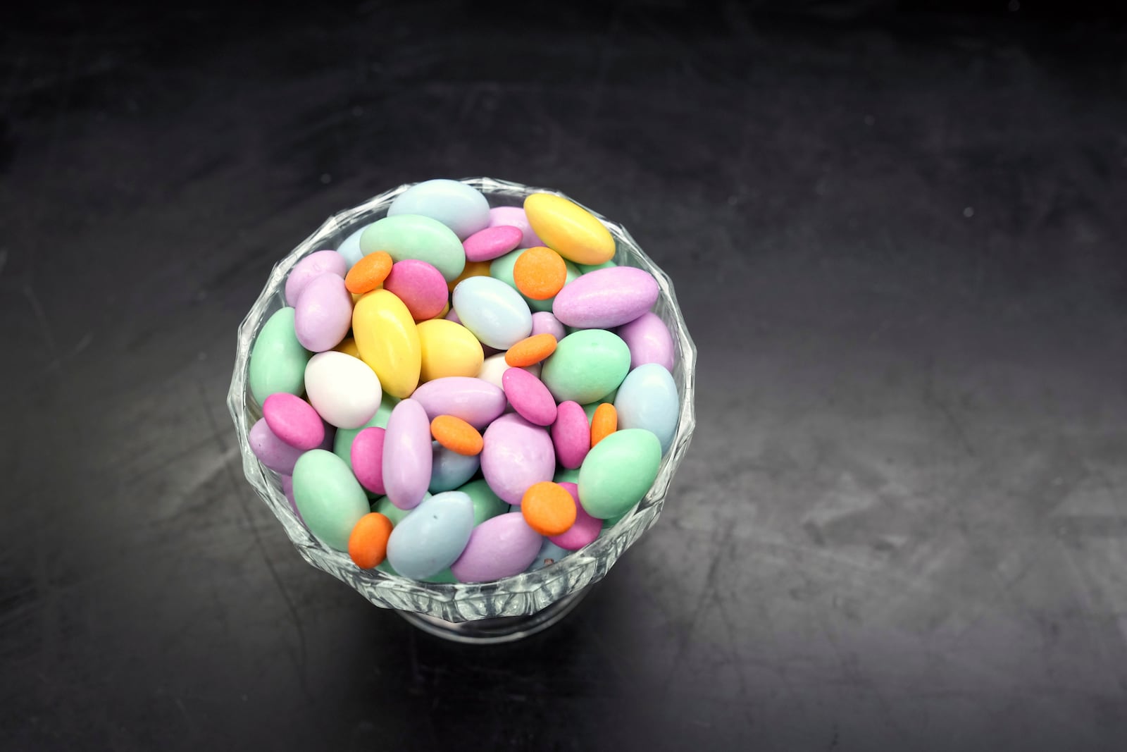 Candy using food coloring are displayed in a lab at Sensient Technologies Corp., a color additive manufacturing company, in St. Louis., on Wednesday, April 2, 2025. (AP Photo/Jeff Roberson)