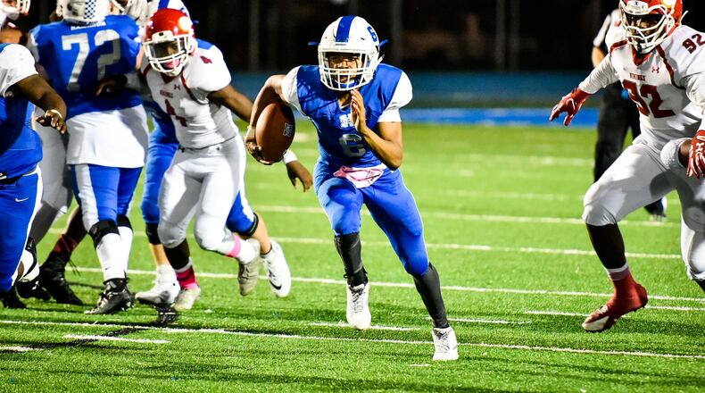 Hamilton quarterback Khaliyal Sowell takes off on a run during last Friday’s 31-17 loss to visiting Princeton at Virgil Schwarm Stadium in Hamilton. NICK GRAHAM/STAFF