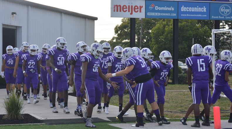 Middletown, shown preparing to take the field before its season opener against Lima Senior on Aug. 25, will be looking to end a 13-game losing streak Friday night against Princeton at Barnitz Stadium. CONTRIBUTED PHOTO BY MARITZA MCKINNEY
