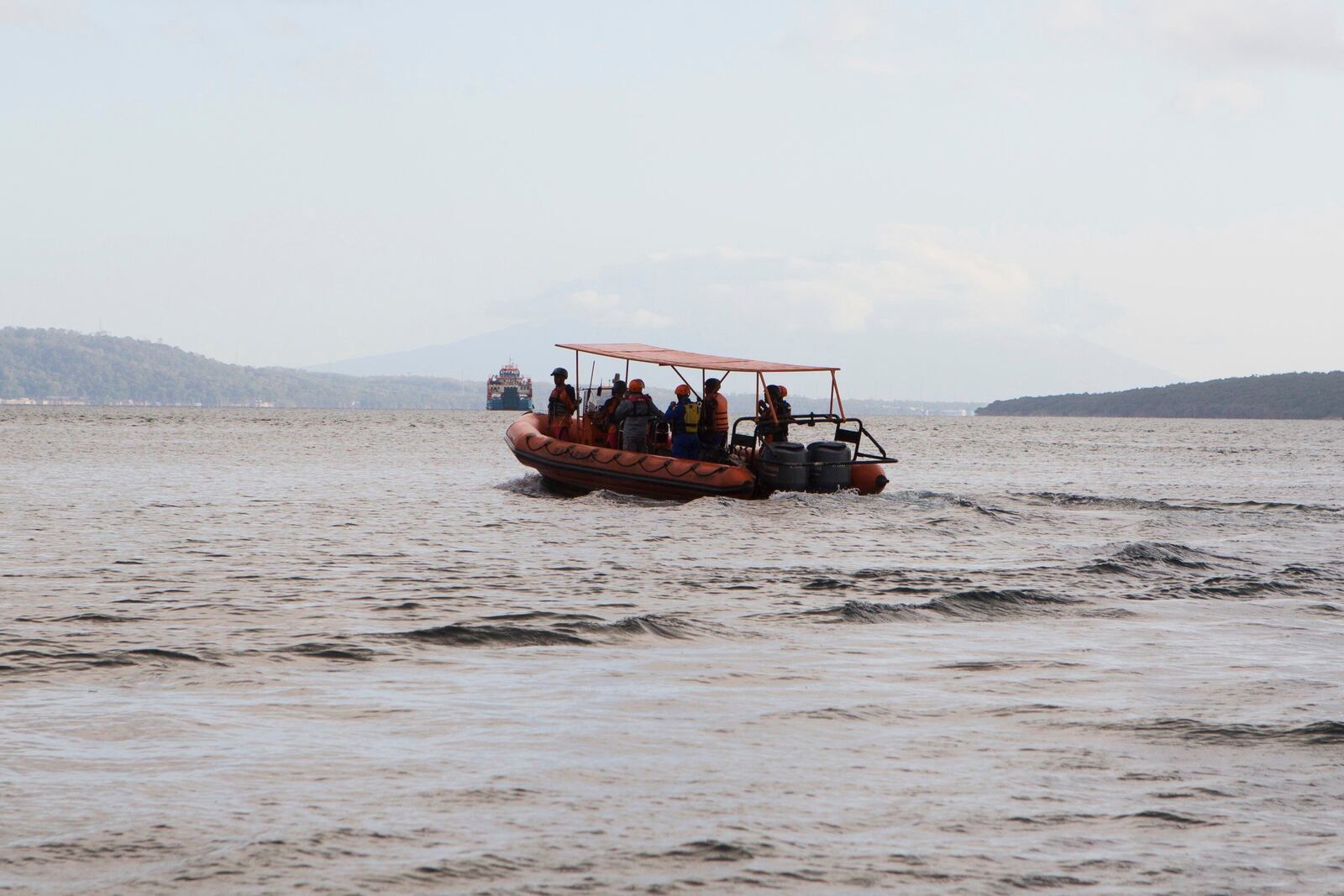 Rescuers search for victims after a ferry sank in the waters off Jembrana, Bali, Indonesia, Friday, July 4, 2025. (AP Photo/Firdia Lisnawati)