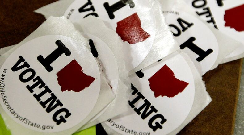 Voting stickers are seen at the Ohio Union during the U.S. presidential election at The Ohio State University in Columbus, Ohio November 6, 2012. REUTERS/Matt Sullivan