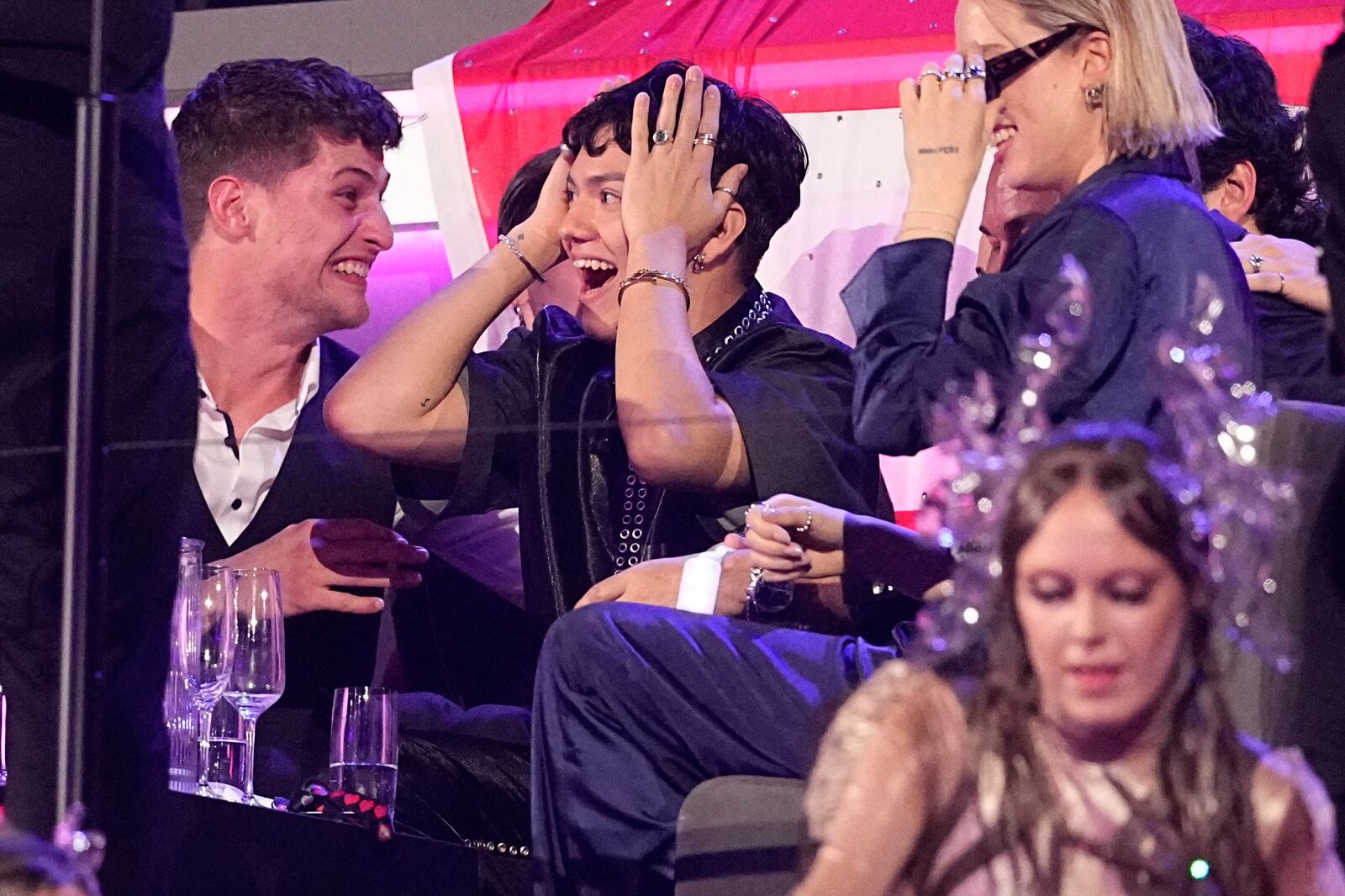 JJ from Austria who performed the song "Wasted Love" reacts to voting during the Grand Final of the 69th Eurovision Song Contest, in Basel, Switzerland, Saturday, May 17, 2025. (AP Photo/Martin Meissner)