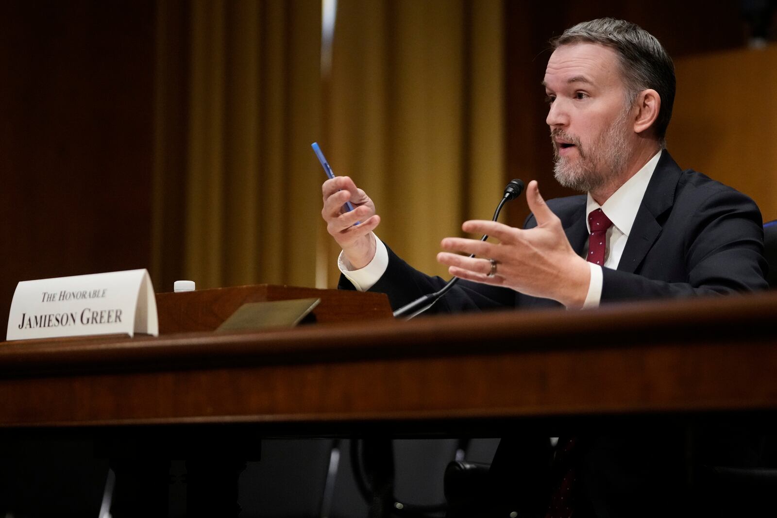 U.S. Trade Representative Jamieson Greer testifies before the Senate Finance Committee on Capitol Hill in Washington, Tuesday, April 8, 2025. (AP Photo/Mark Schiefelbein)
