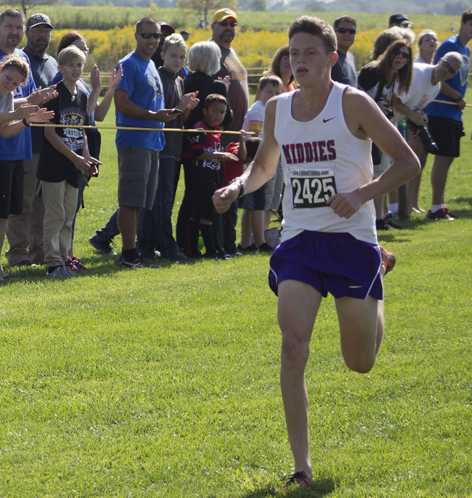 Middletown High School junior Conant Smith nears the finish line at Saturday’s Cedarville University Friendship Invitational. Smith finished in 15:24.5 to win the 25-team Division I race. CONTRIBUTED PHOTO BY JEFF GILBERT