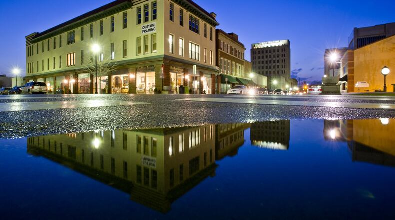 The idea for Ohio’s first Designated Outdoor Refreshment Area came from the owners of BeauVerre Riordan Stained Glass Studios in Middletown. Like other DORAs across the state, the Middletown DORA was set up to bring people back downtown. This photo was taken in 2012 before a First Friday event, before the DORA was established. Photo by Nick Graham
