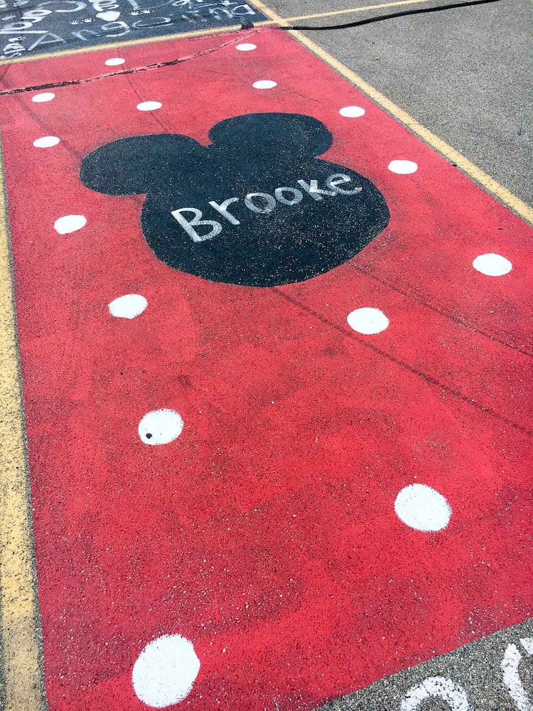 PHOTOS Lakota East seniors paint parking spots