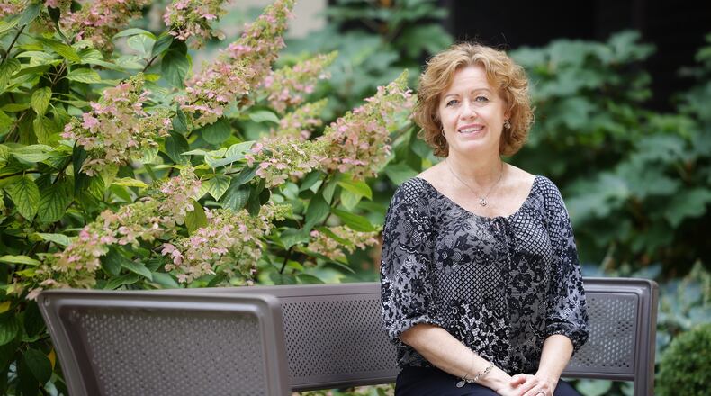 Kelly Huntey, 54, a registered nurse at Atrium Medical Center, had a double mastectomy after cancer was found in her right breast. NICK GRAHAM / STAFF