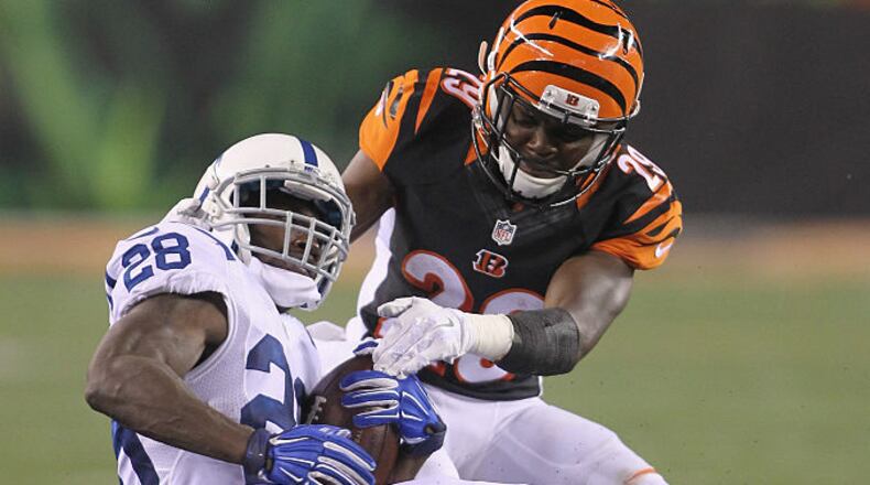 CINCINNATI, OH - SEPTEMBER 01: Jordan Todman #28 of the Indianapolis Colts runs the football upfield against Tony McRae #29 of the Cincinnati Bengals at Paul Brown Stadium on September 1, 2016 in Cincinnati, Ohio. The Colts defeated the Bengals 13-10. (Photo by John Grieshop/Getty Images)