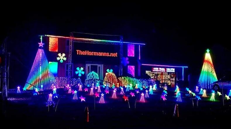 Christmas at the Hormanns is one of the largest private holiday light displays in northern Cincinnati. The home is located at 6656 Devon Drive in Liberty Twp. in Butler County. The family uses a computer control the lights. GREG LYNCH / STAFF