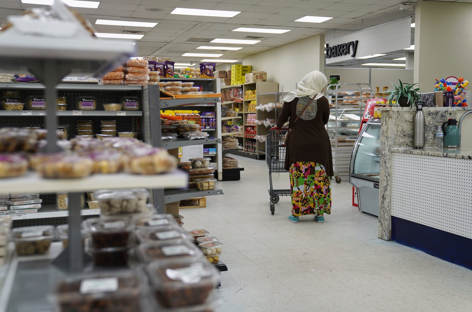 Locals shop at the Finest Supermarket halal grocery store in Fredericksburg, Va., on Monday, April 7, 2025. (AP Photo/Jessie Wardarski)