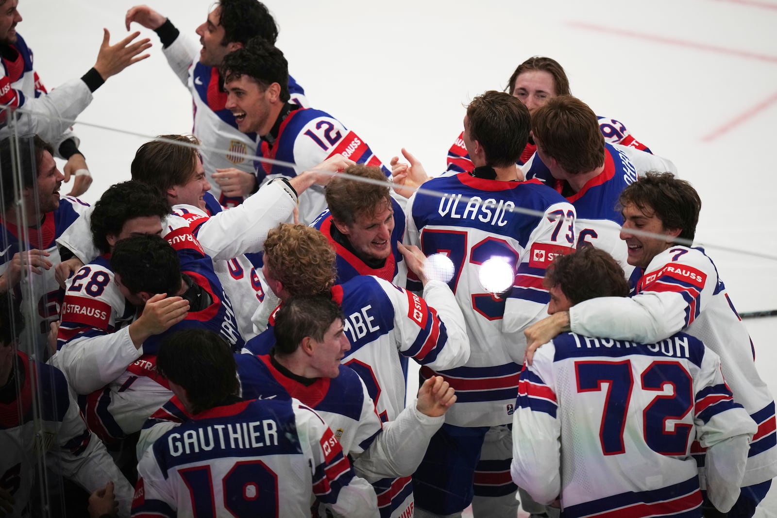 Team USA celebrates after winning the final match between United States and Switzerland at the ice hockey world championships in Stockholm, Sweden, Sunday, May 25, 2025. (AP Photo/Petr David Josek)