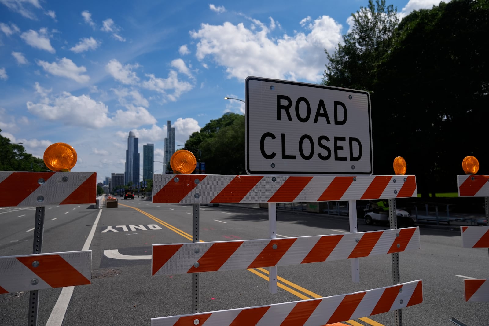 Construction of the street course continues ahead of the NASCAR auto racs, Friday, June 27, 2025, in downtown Chicago. (AP Photo/Erin Hooley)