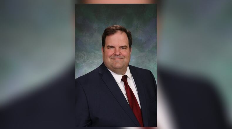 John M. Holcomb SUBMITTED