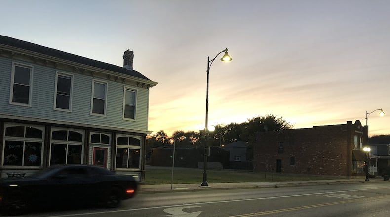 Hamilton is buying the empty lots at 509- and 515 Main St. for about $30,000. MIKE RUTLEDGE/STAFF