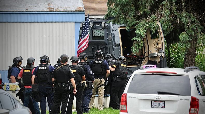 SWAT officers respond to Harmony Estates in Harmony Township. MARSHALL GORBY/STAFF