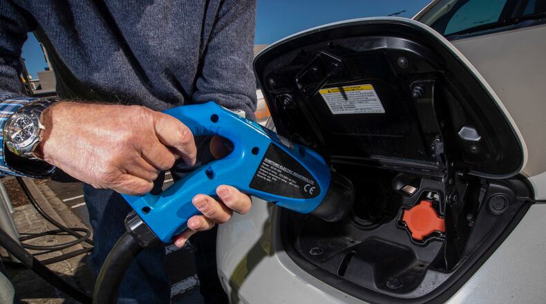 An electric vehicle charging station is shown here. One of Oxford's primary goals is to get a grant application to the Ohio EPA to fund installation of electric vehicle charging stations in the Uptown parks. AP PHOTO