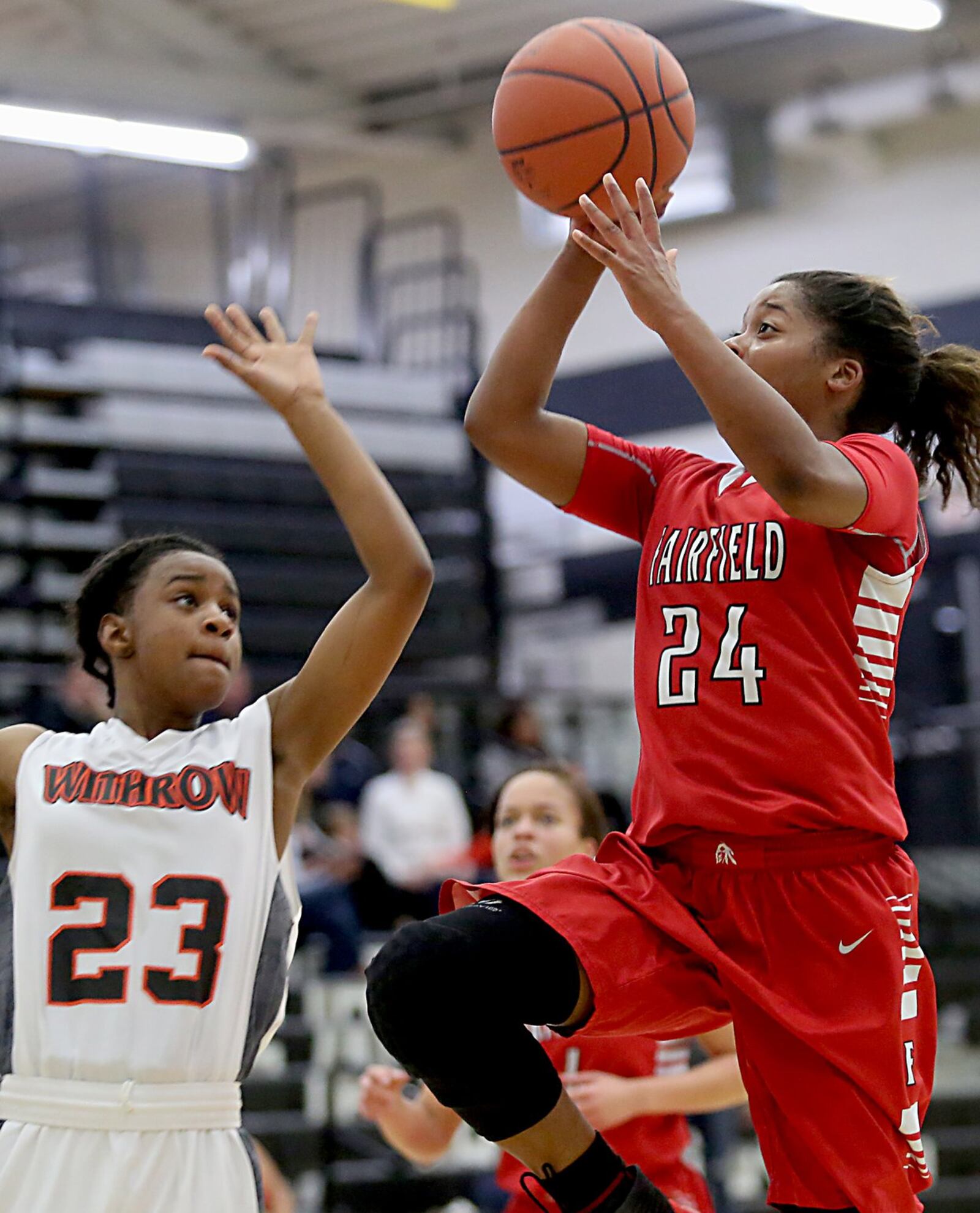 Fairfield guard Brooke Spaulding puts up a shot against Withrow guard Jaenay Hines on Saturday afternoon during Division I sectional play at Lakota East. CONTRIBUTED PHOTO BY E.L. HUBBARD