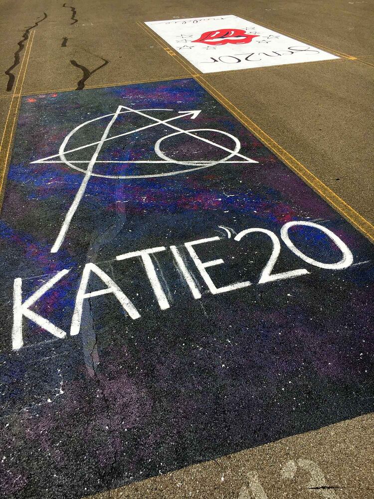 PHOTOS Lakota East seniors paint parking spots