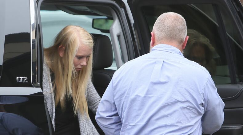 Brooke Skylar Richardson gets out of a vehicle on her way into a court appearance July 21.