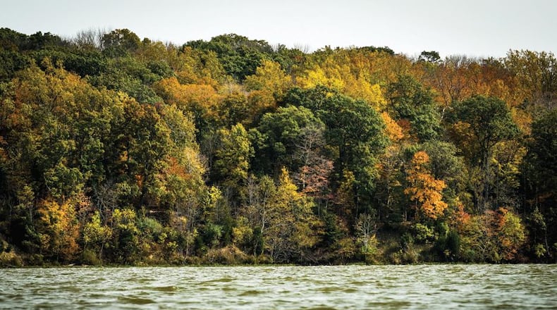 FILE: Splashes of fall color, like here at Hueston Woods State Park, are on display throughout the region as the weather turns colder. 2016 NICK GRAHAM/STAFF