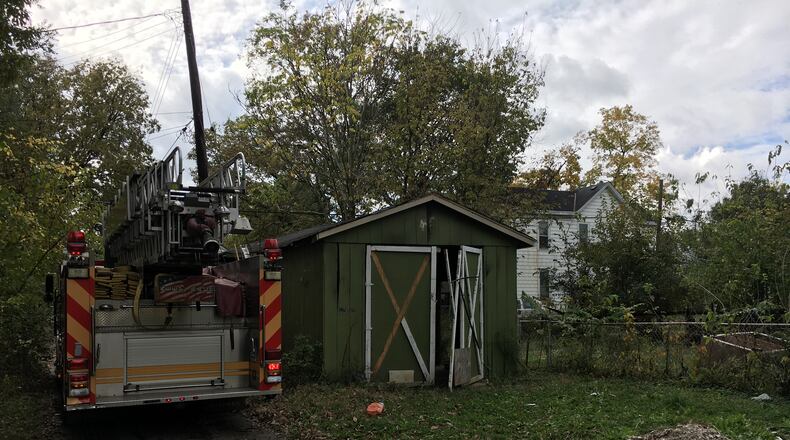 A fire in a detached garage on Fairmount Avenue may have been started by homeless people, according to firefighters. RICK McCRABB/STAFF