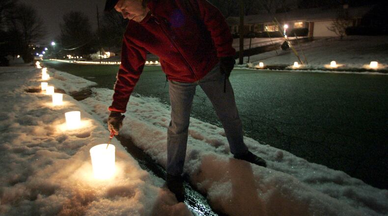 Fisher Avenue from Dix Road to Schirm Drive in Middletown will again light up this year with approximately 1,000 luminarias in memory of deceased residents and former residents. STAFF FILE PHOTO