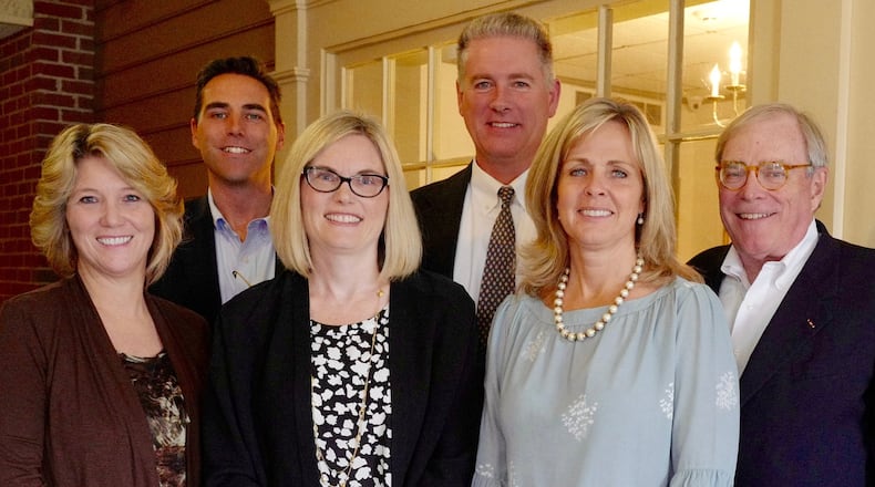 The Beaton and Fey insurance firms are merging to form Fey Bruder Insurance Advisors. Pictured, front, from left are Michelle Garrett, Holly Bruder, Elizabeth Fey Mundy and Tom Fey. Back row, Brian Fey and Matt Green. CONTRIBUTED