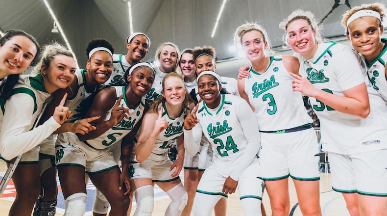 Lakota West graduate Abby Prohaska (center, No. 12) as a freshman on the Notre Dame women’s basketball team. PHOTO COURTESY OF NOTRE DAME