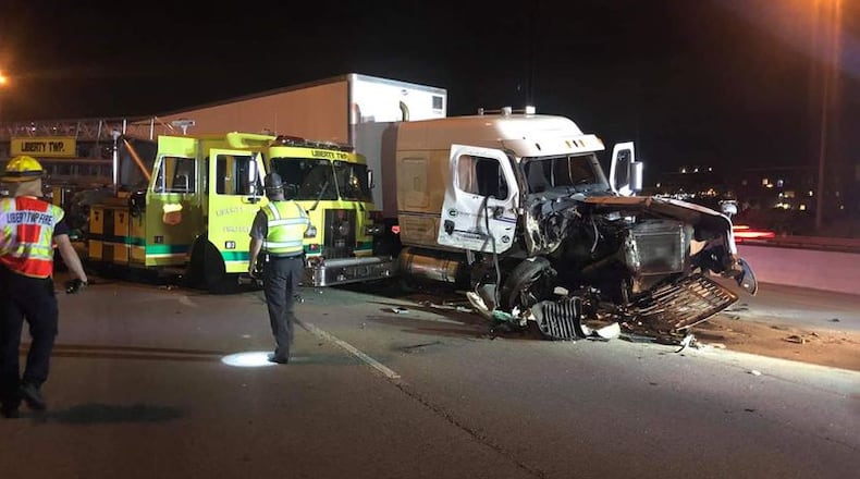 This 2019 crash on Interstate 75 totaled a Liberty Twp. fire truck that was serving as a protective safety barrier for an EMS and firefighter crew working a collision and injury scene on the road's shoulder. That crash and loss of the fire truck has now prompted Liberty to enter into a agreement with West Chester Twp. and the city of Monroe to instead use a 1999 fire truck for crew protection from other vehicles at future crash scenes on high-speedy roadways. FILE PHOTO