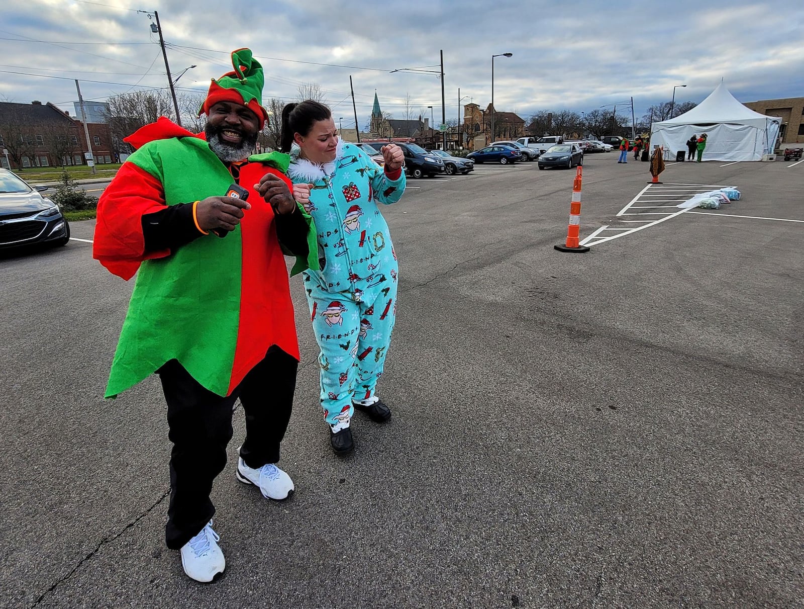 Volunteers passed out presents and bikes Sunday during the 14th annual Louella Thompson's Feed the Hungry Project Toy Giveaway. NICK GRAHAM/STAFF