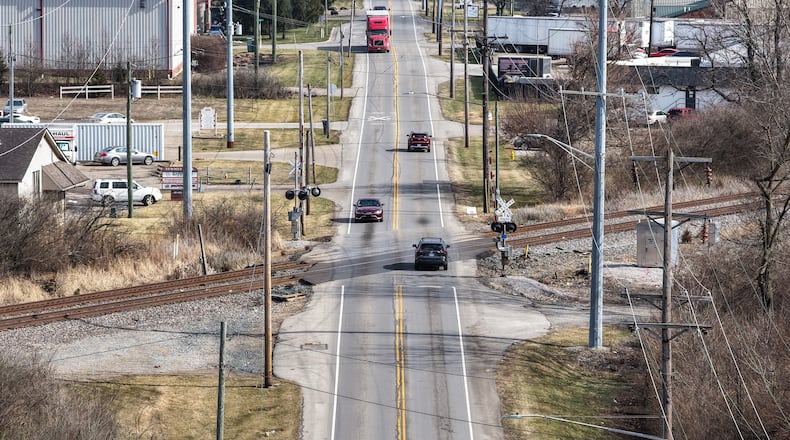 The railroad crossing on Symmes Road (pictured) and N. Gilmore Road in Fairfield will be redone to improve safety. NICK GRAHAM/STAFF