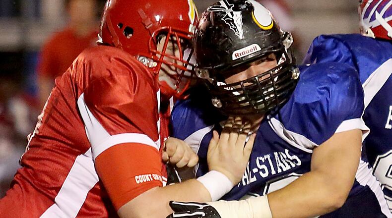 West offensive lineman Logan O’Neil of Fairfield (left) squares off with East defensive lineman Hunter Burdno of Lakota East on Thursday during the Ron Woyan East-West All-Star Game at Kings. CONTRIBUTED PHOTO BY E.L. HUBBARD