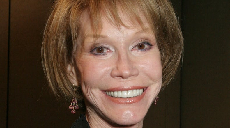 FILE - This Sept. 19, 2015, file photo shows Mary Tyler Moore at the 26th Annual News and Documentary Emmy Awards ceremony in New York. Moore died Wednesday, Jan. 25, 2017, at age 80. (AP Photo/Tina Fineberg, File)