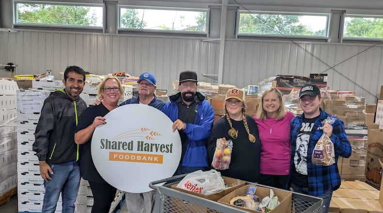 Members of the Hamilton Chamber of Commerce help at a Shared Harvest food drive. SUBMITTED PHOTO