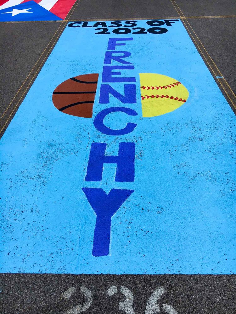 PHOTOS Lakota East seniors paint parking spots