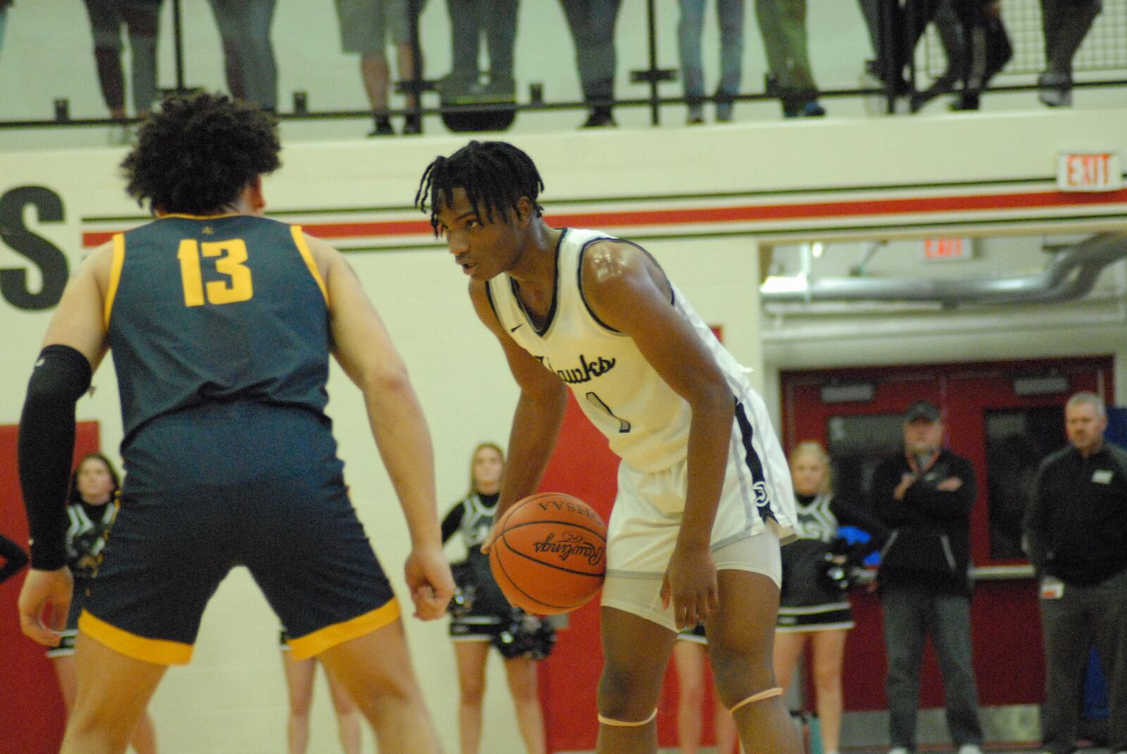 Lakota East senior Lebron Powell surveys the court against Moeller during a Division I sectional final contest on Saturday at Lakota West. The Thunderhawks fell 51-50.