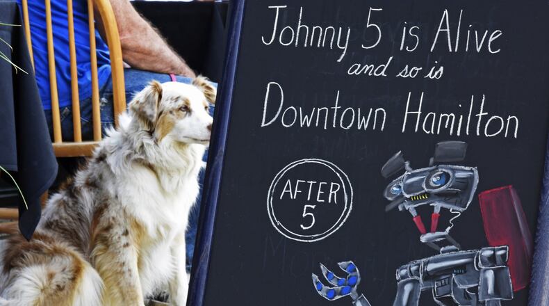 Businesses in downtown Hamilton will be open for “Alive After Five” on the final Friday of the month for shopping opportunities in July, August and September. This photo is from a past year's event. NICK GRAHAM/STAFF