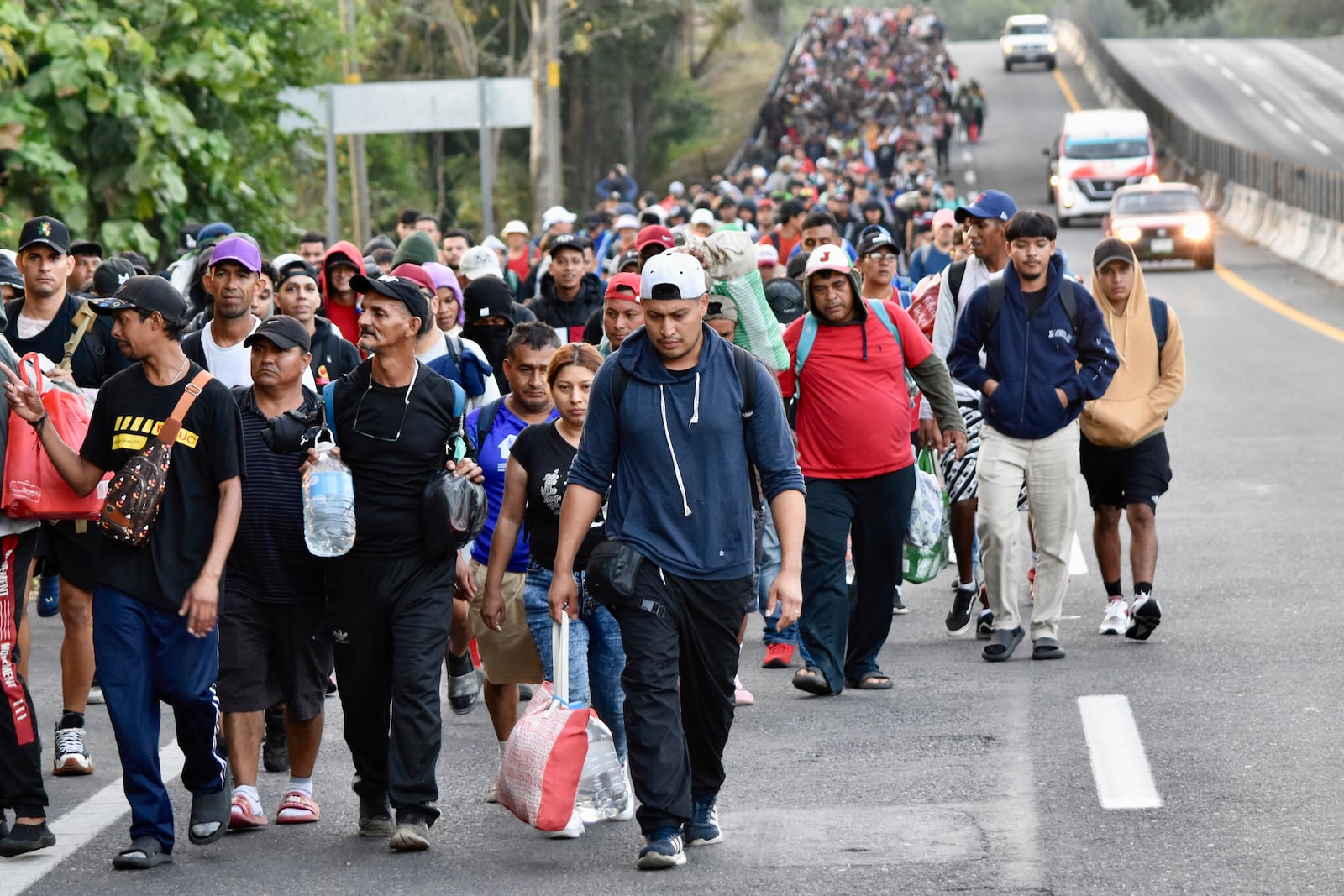 Migrants walk through Tapachula, Chiapas state, Mexico, in an attempt to reach the U.S. border, Monday, Jan. 20, 2025, the inauguration day of U.S. President Donald Trump. (AP Photo/Edgar H. Clemente)
