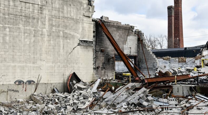 Rubble remains in a section of the former Middletown Paperboard building on Verity Parkway after a fire destroyed a part of structure in February of 2018. NICK GRAHAM/STAFF